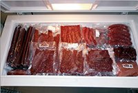 freezer filled with meat for dog