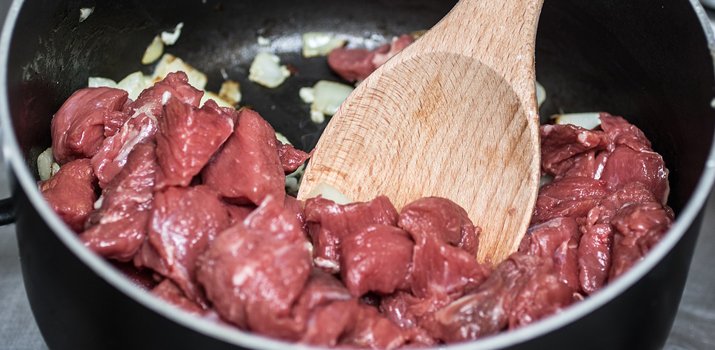 raw meat in a bowl to make a delicious dog meal
